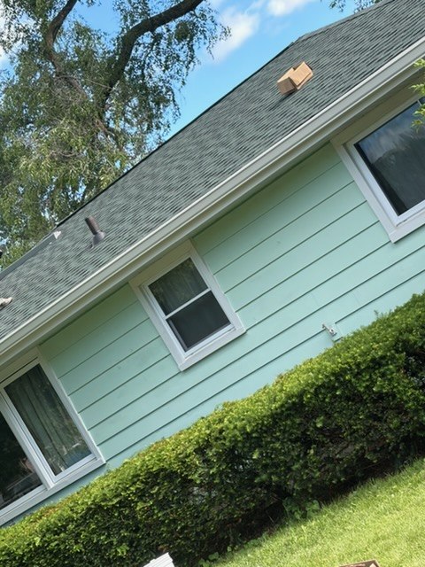 Before: rotted fascia board
